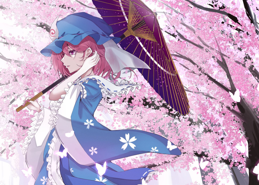 1girl blue_headwear blue_kimono cherry_blossom_print cherry_blossoms commentary_request floral_print from_side hand_in_own_hair hat highres holding holding_umbrella japanese_clothes kimono kuro_wa_shinoru long_sleeves looking_at_viewer mob_cap oil-paper_umbrella outdoors parted_lips pink_hair saigyouji_yuyuko short_hair solo touhou triangular_headpiece umbrella wide_sleeves