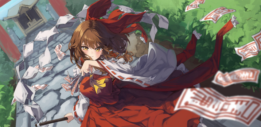1girl absurdres ascot bow brown_eyes brown_hair detached_sleeves gohei hair_bow hair_tubes hakurei_reimu highres lab2linch long_hair looking_at_viewer nontraditional_miko ofuda red_shirt red_skirt shirt skirt solo touhou wide_sleeves yellow_ascot