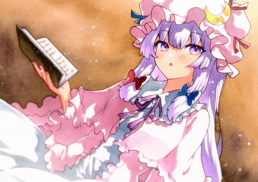 1girl blush book crescent crescent_hat_ornament dress hair_between_eyes hat hat_ornament highres holding holding_book long_hair long_sleeves mob_cap open_book open_mouth patchouli_knowledge pink_dress pink_headwear purple_hair qqqrinkappp solo touhou violet_eyes