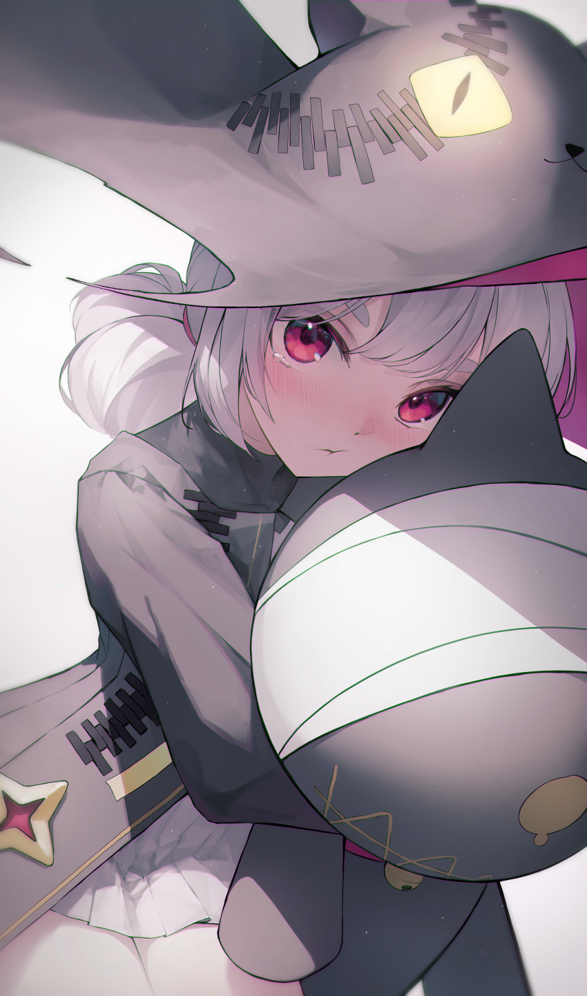 1girl absurdres bandages blush crystalherb glowing glowing_eyes grey_hair hat highres hugging_object looking_at_viewer medium_hair original pink_eyes slit_pupils solo standing stuffed_animal stuffed_toy tearing_up thick_eyebrows white_background witch_hat