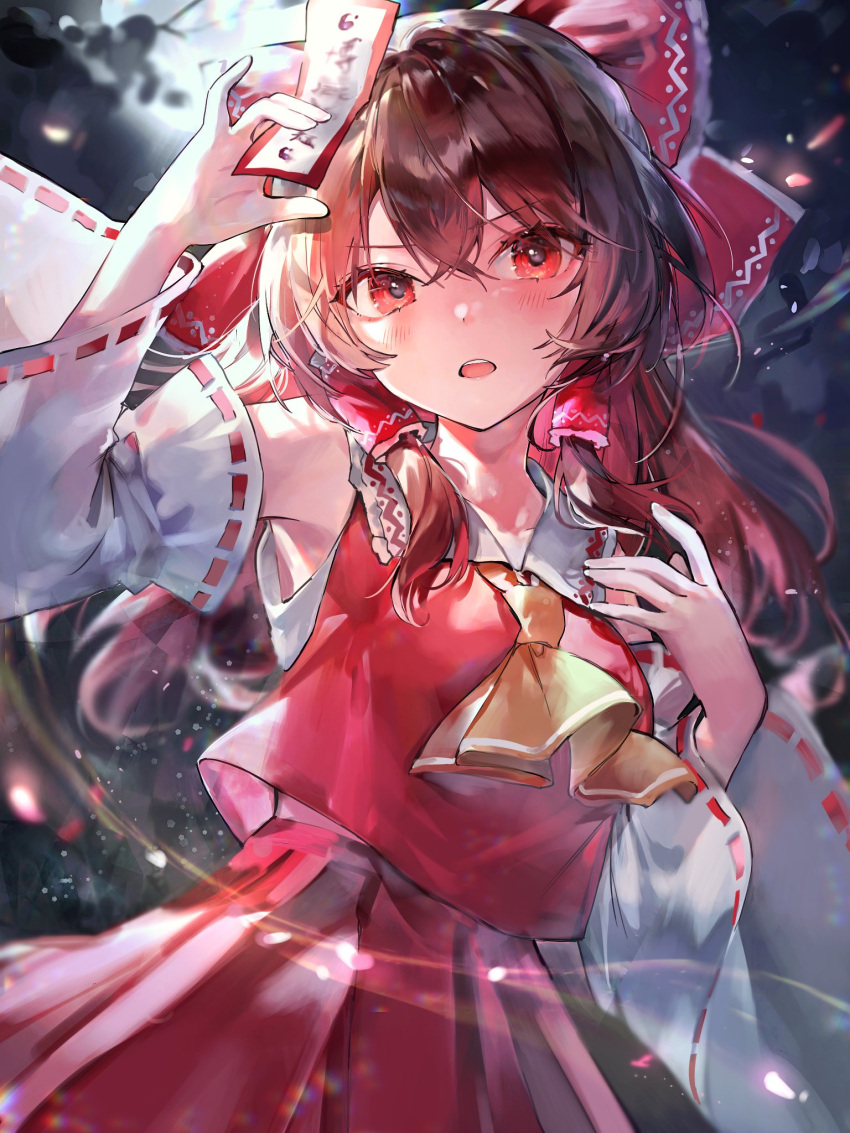 1girl ame929 ascot bare_shoulders blush bow brown_hair detached_sleeves hair_between_eyes hair_bow hair_tubes hakurei_reimu highres holding japanese_clothes long_hair looking_at_viewer nontraditional_miko ofuda open_mouth red_bow red_eyes red_skirt ribbon-trimmed_sleeves ribbon_trim sidelocks skirt solo touhou white_sleeves wide_sleeves yellow_ascot