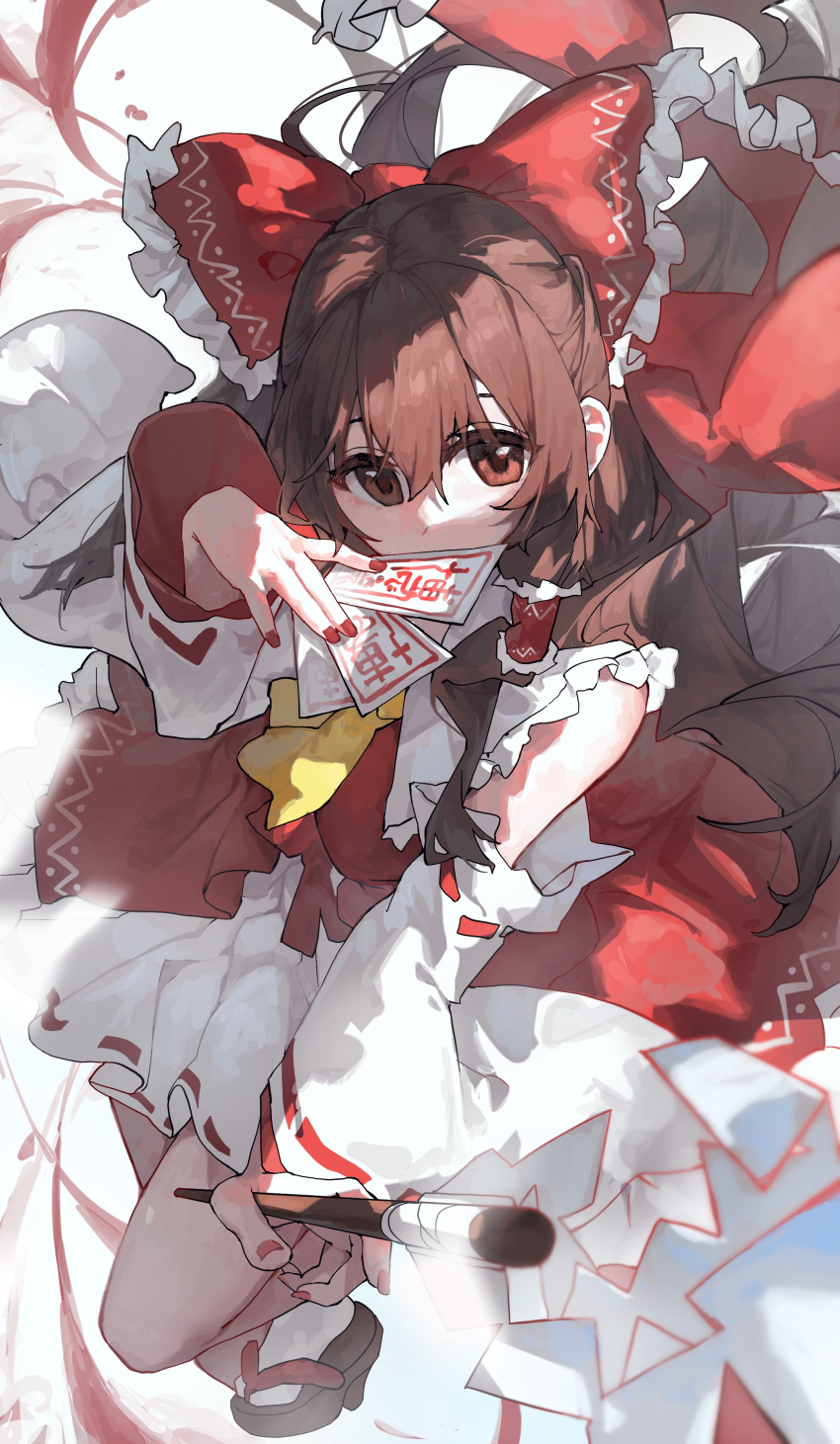 1girl absurdres ascot bare_shoulders bow brown_eyes brown_hair detached_sleeves fingernails gohei hair_between_eyes hair_bow hair_tubes hakurei_reimu highres holding holding_gohei japanese_clothes long_hair nail_polish nontraditional_miko ofuda red_bow red_nails red_skirt ribbon-trimmed_sleeves ribbon_trim sentter sidelocks skirt socks solo touhou white_sleeves white_socks wide_sleeves yellow_ascot