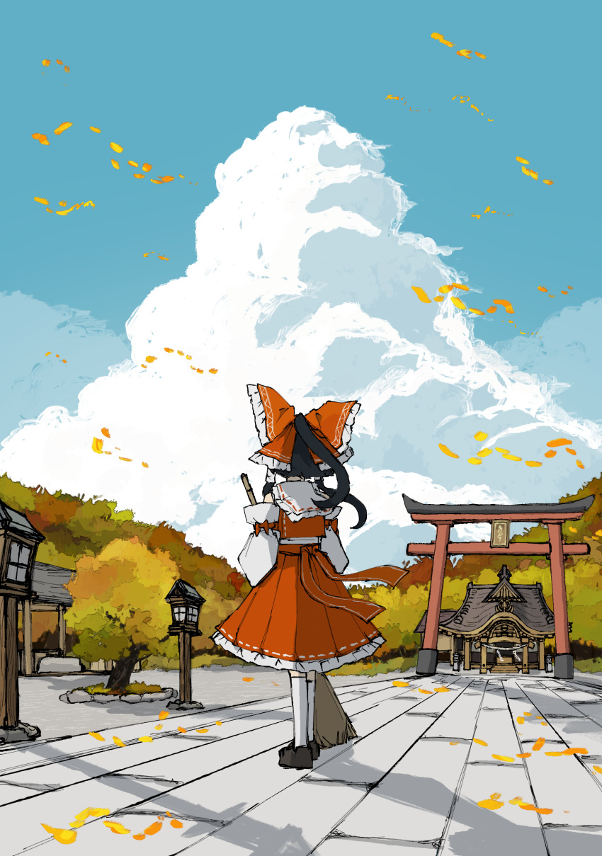 1girl absurdres black_hair blue_sky bow broom brown_footwear clouds day detached_sleeves facing_away falling_leaves frilled_bow frilled_skirt frills from_behind hair_bow hakurei_reimu hakurei_shrine highres holding holding_broom kneehighs lantern leaf legs_together long_hair neruzou outdoors ponytail red_bow red_ribbon red_skirt red_vest ribbon shoes shrine sidelocks skirt skirt_set sky socks solo standing sweeping torii touhou tree vest white_socks wind wooden_lantern