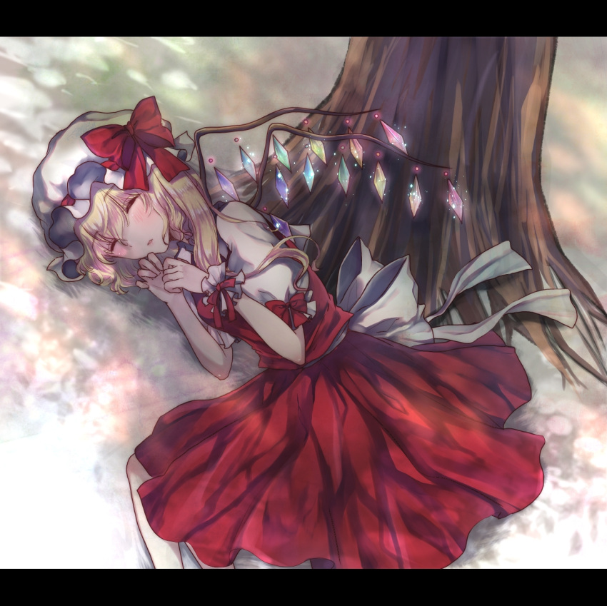 1girl back_bow blonde_hair bow closed_eyes collared_shirt feet_out_of_frame flandre_scarlet ginzuki_ringo glowing glowing_wings grass hair_between_eyes hat hat_ribbon highres large_bow letterboxed lying medium_hair mob_cap multicolored_wings on_ground on_side one_side_up open_mouth outdoors puffy_short_sleeves puffy_sleeves red_bow red_ribbon red_vest ribbon ribbon-trimmed_headwear ribbon_trim shirt short_sleeves skirt skirt_set sleeping sleeve_bow solo sparkle touhou tree vest white_bow white_headwear white_shirt wings wrist_cuffs