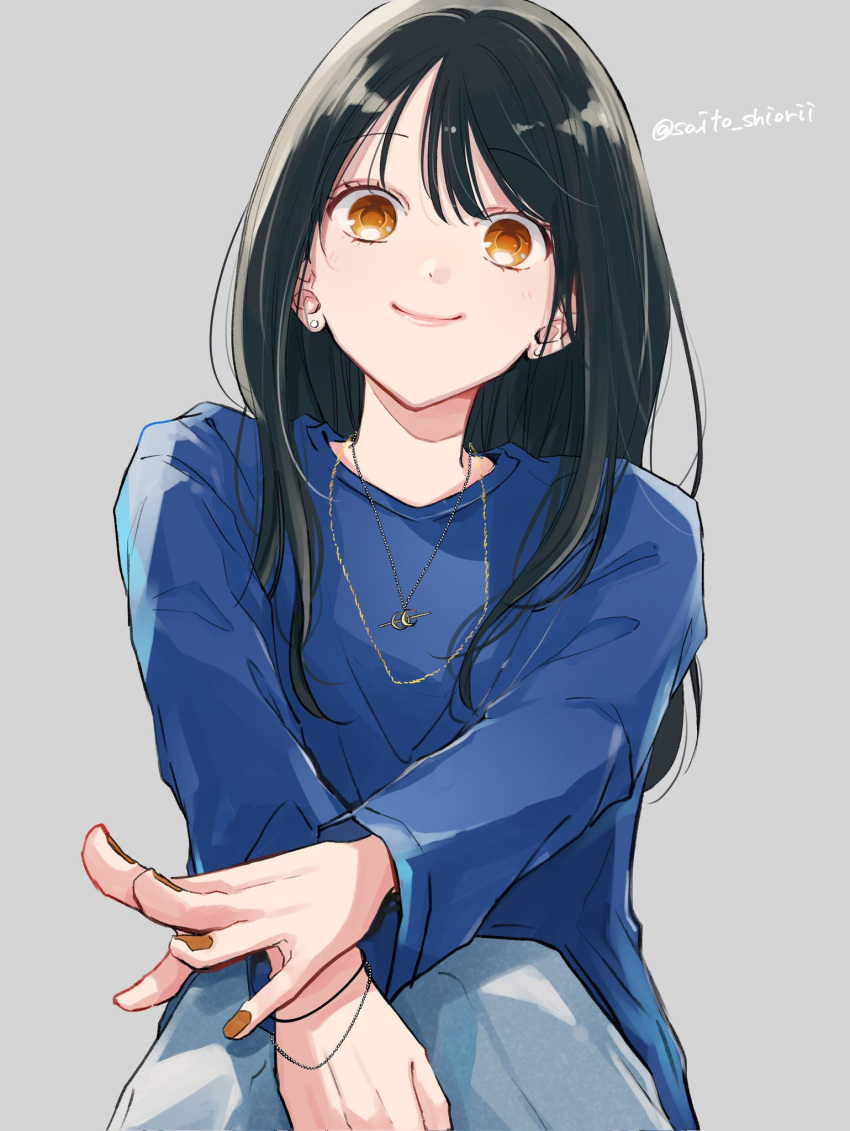 1girl black_hair blue_pants blue_shirt bracelet brown_nails closed_mouth earrings fingernails gold_necklace grey_background hair_over_shoulder highres jewelry long_hair long_sleeves looking_at_viewer multiple_necklaces nail_polish necklace orange_eyes original pants pink_lips saitou_shiori_(pixiv14549321) shirt simple_background sitting smile smug solo stud_earrings t-shirt twitter_username