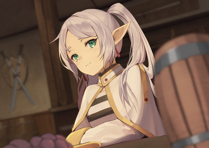 1girl beer_mug blurry blurry_background closed_mouth cup elf frieren green_eyes highres indoors long_hair long_sleeves looking_at_viewer mug pointy_ears robe shield sitting smile solo sombie sousou_no_frieren sword table thick_eyebrows twintails weapon white_hair white_robe
