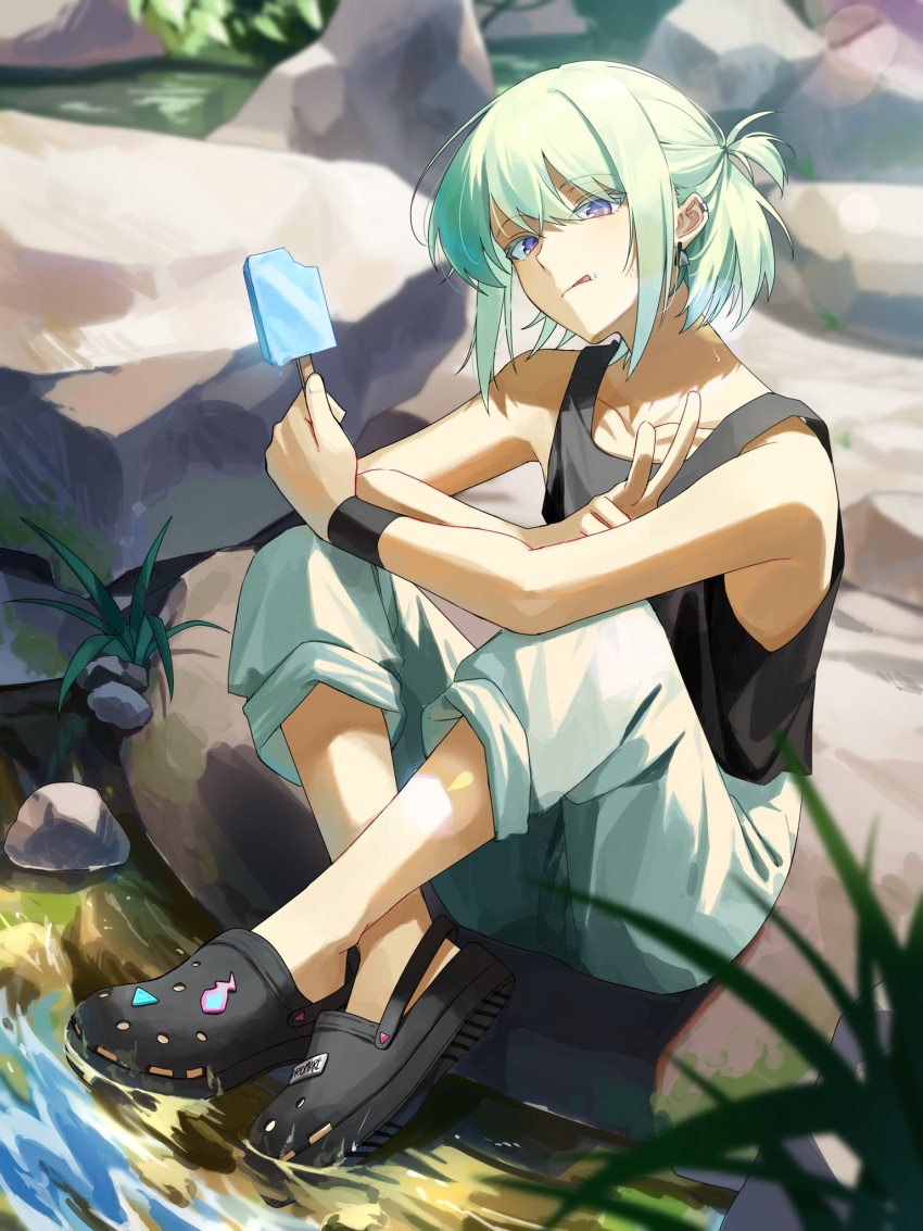 1boy :q alternate_costume alternate_hairstyle black_footwear black_tank_top black_wristband casual colored_eyelashes commentary crocs crossed_ankles earrings food full_body green_hair highres holding holding_food holding_popsicle jewelry knees_up lio_fotia looking_at_viewer male_focus one_side_up otoko_no_ko outdoors pants pants_rolled_up popsicle prmattotia promare rock short_hair sidelocks sitting solo symbol-only_commentary tank_top tongue tongue_out triangle_earrings v violet_eyes white_pants