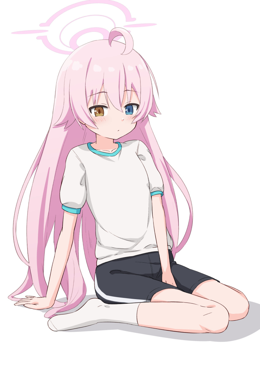 1girl ahoge between_legs black_shorts blue_archive blue_eyes blush brown_eyes closed_mouth collarbone commentary_request full_body gym_shirt gym_shorts gym_uniform hair_between_eyes halo hand_between_legs heterochromia highres hoshino_(blue_archive) long_hair pink_hair puffy_short_sleeves puffy_sleeves shadow shirt short_sleeves shorts simple_background sitting socks solo takasuma_hiro very_long_hair wariza white_background white_socks