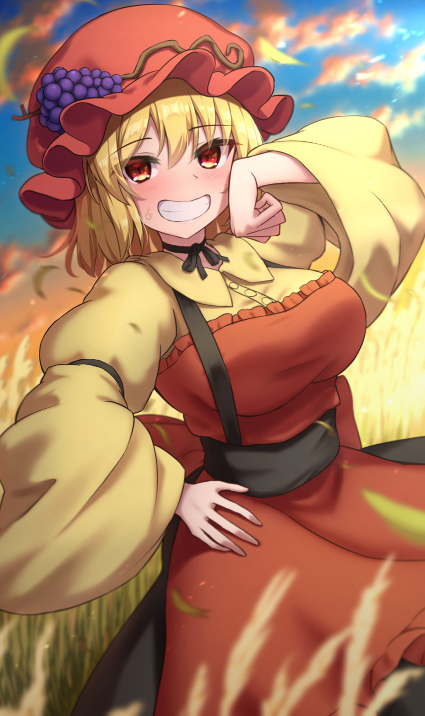 1girl aki_minoriko apron blonde_hair blurry blurry_background fruit_hat_ornament grape_hat_ornament highres looking_at_viewer outdoors red_apron red_eyes red_headwear shirt smile solo touhou wide_sleeves yellow_shirt yosshy
