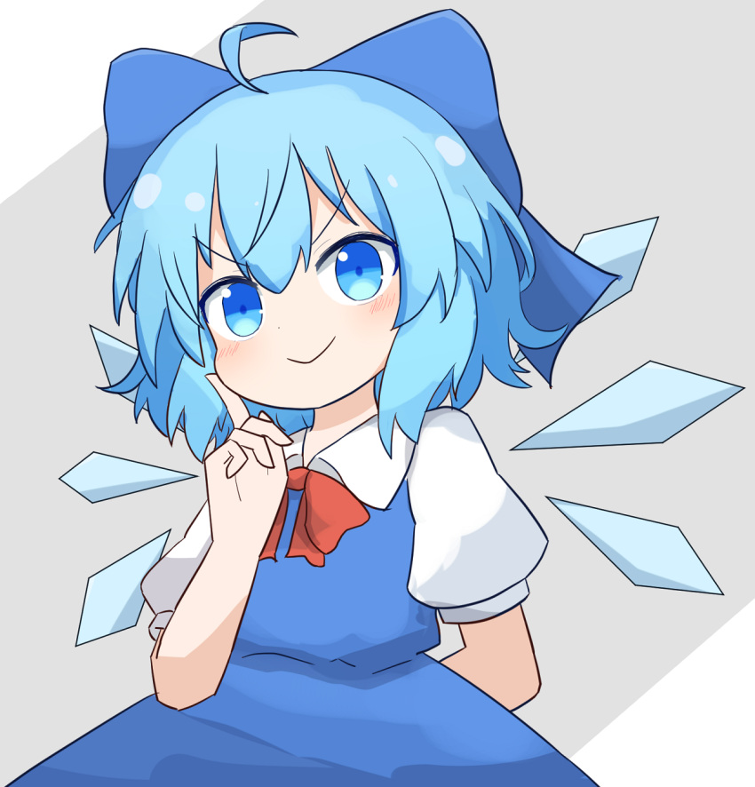 1girl ahoge arm_behind_back blue_bow blue_dress blue_eyes blue_hair bow cirno closed_mouth collared_shirt commentary_request coruthi doyagao dress finger_to_cheek grey_background hair_bow highres medium_hair neck_ribbon pinafore_dress puffy_short_sleeves puffy_sleeves red_ribbon ribbon shirt short_sleeves simple_background sleeveless sleeveless_dress smile smug solo touhou v-shaped_eyebrows white_shirt