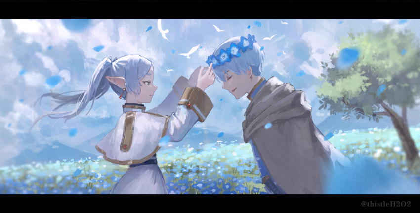 1boy 1girl awayoi_ayame blue_flower blue_hair blue_sky blurry blurry_foreground capelet cloak closed_eyes clouds cloudy_sky commentary_request cowboy_shot day earrings elf falling_petals field flower flower_field frieren from_side gold_trim green_eyes hands_up head_wreath high_collar highres himmel_(sousou_no_frieren) jewelry letterboxed long_hair long_sleeves looking_at_another mole mole_under_eye mountainous_horizon open_mouth outdoors petals pointy_ears profile skirt skirt_set sky smile sousou_no_frieren standing tree twintails white_capelet white_hair white_skirt