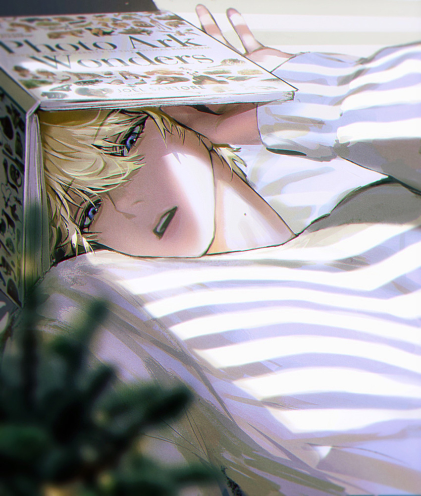 1boy arm_up blonde_hair blurry blurry_foreground book book_on_head commentary english_commentary eyelashes hair_between_eyes highres long_sleeves looking_at_viewer lying male_focus mole mole_on_neck nijisanji nijisanji_en object_on_head on_back open_book open_mouth pearl_(pe4rrrrrl) short_hair sleeves_past_wrists solo sonny_brisko sweater teeth upper_body upper_teeth_only violet_eyes virtual_youtuber white_sweater