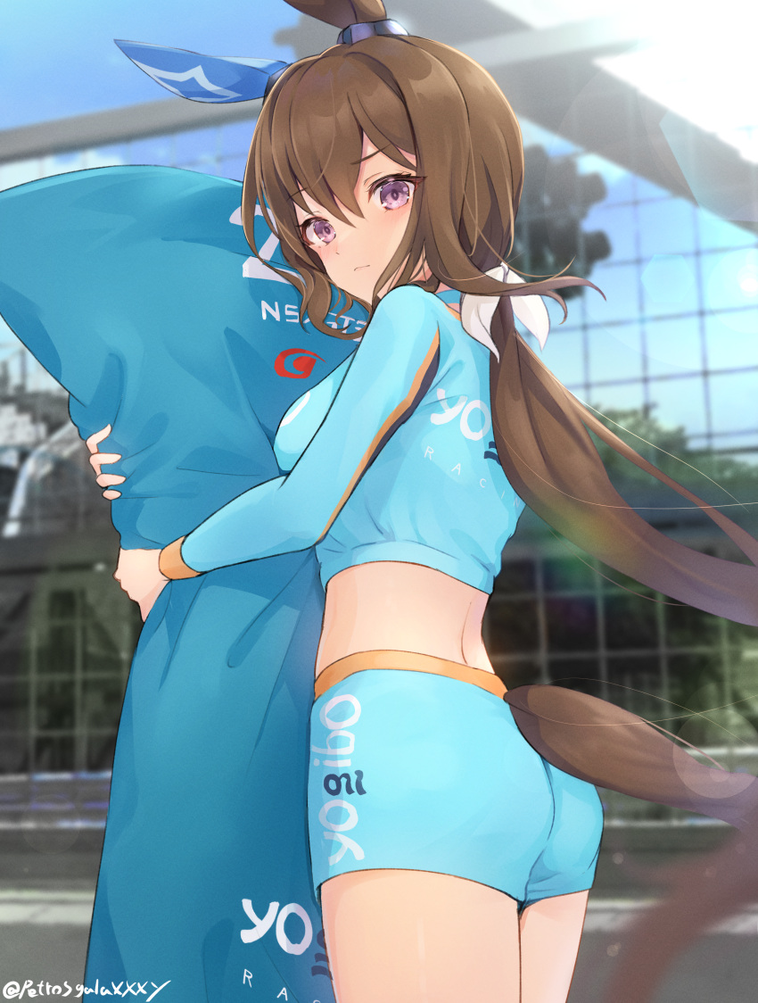 1girl absurdres admire_vega_(umamusume) animal_ears ass blurry blurry_background breasts brown_hair closed_mouth hair_between_eyes hair_ornament highres horse_ears horse_tail hug hugging_object lens_flare looking_at_viewer medium_breasts peteron pillow ponytail racequeen shorts solo tail twitter_username umamusume violet_eyes