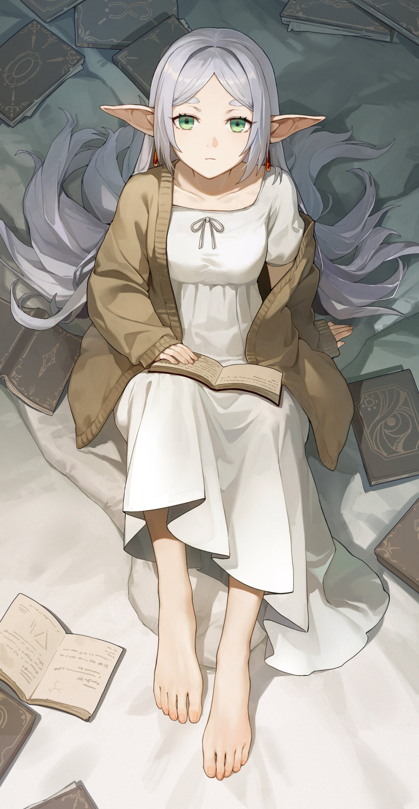 1girl absurdres barefoot book broken_(7589468) brown_sweater closed_mouth collarbone earrings elf feet frieren green_eyes highres holding holding_book jewelry knees_up long_hair long_sleeves looking_at_viewer off_shoulder on_floor open_book pointy_ears robe sitting solo sousou_no_frieren sweater thick_eyebrows toenails toes white_hair white_robe