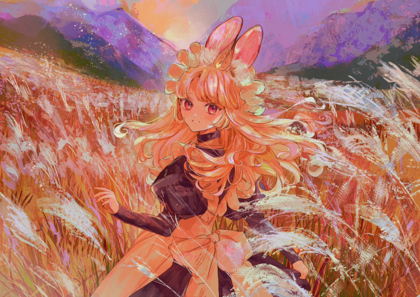1girl animal_ear_fluff animal_ears apron back_bow black_dress blonde_hair blush bow collared_dress cowboy_shot day dress field floating_hair frilled_apron frills highres jamu_(yakinikuoi4) juliet_sleeves long_hair long_sleeves looking_at_viewer looking_back maid_headdress mountainous_horizon nature outdoors puffy_sleeves rabbit_ears rabbit_girl skirt_hold smile solo standing touhou white_apron