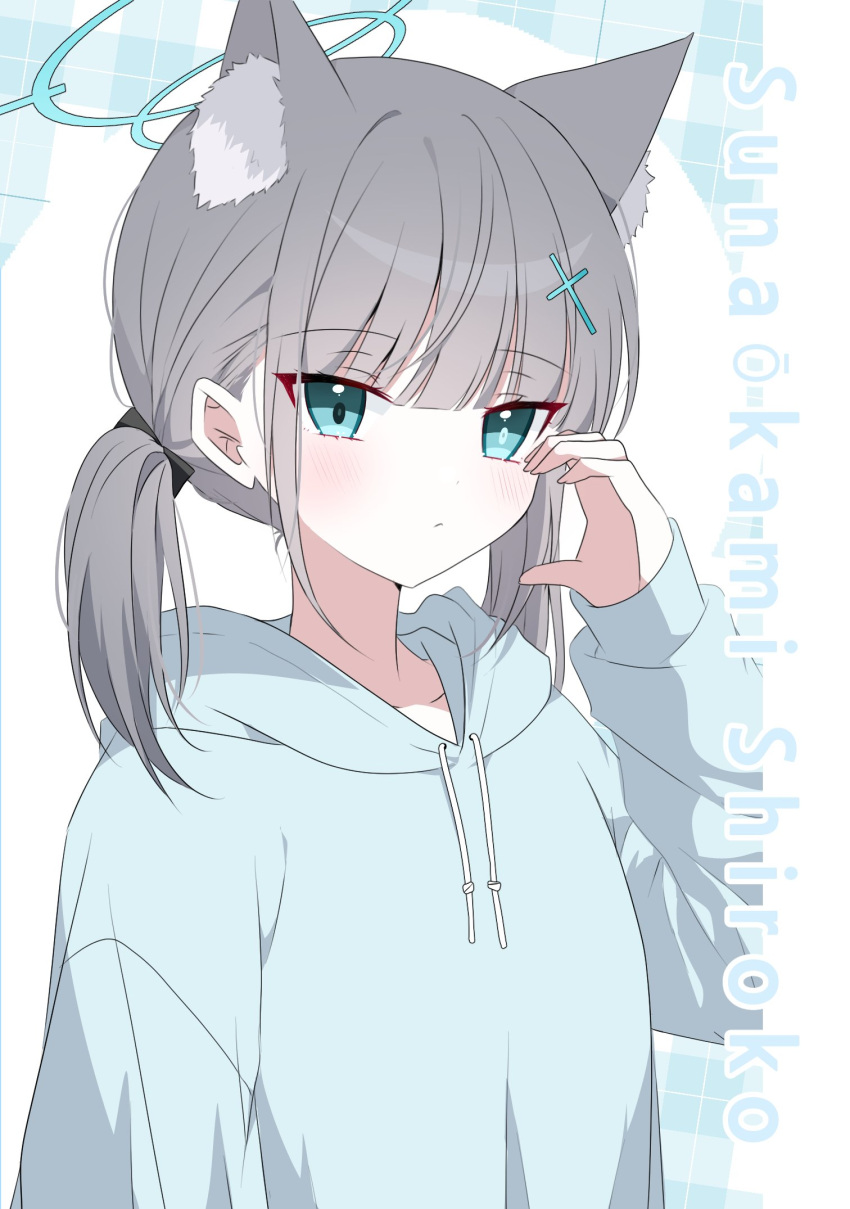 1girl alternate_hairstyle animal_ear_fluff animal_ears blue_archive blue_eyes blue_hoodie blunt_bangs character_name closed_mouth collarbone cross_hair_ornament drawstring english_text grey_hair hair_between_eyes hair_ornament half-heart_hands halo hand_up highres hood hood_down hoodie light_blue_background light_blush long_sleeves looking_at_viewer low_twintails medium_hair mismatched_pupils plaid plaid_background seno_(senohime) shiroko_(blue_archive) sidelocks sleeves_past_wrists solo twintails wolf_ears