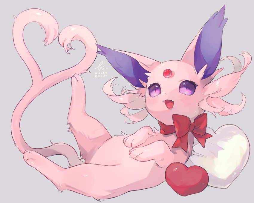 animal_focus bow bowtie espeon fang forehead_jewel full_body gem grey_background happy heart heart_pillow hideko_(l33l3b) highres lying no_humans on_back open_mouth pillow pokemon pokemon_(creature) red_bow red_gemstone signature simple_background smile solo twitter_username valentine violet_eyes
