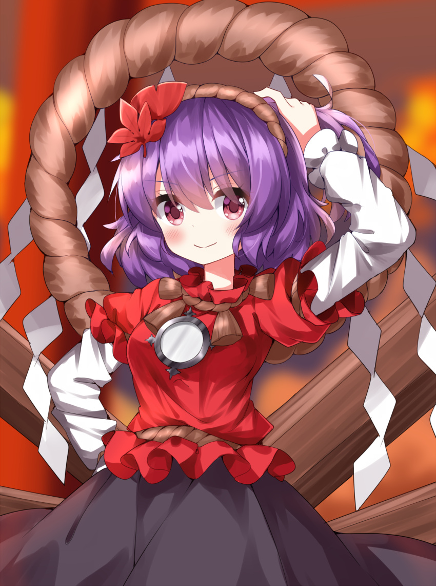 1girl arm_up black_skirt blurry blurry_background closed_mouth commentary_request hair_ornament highres layered_sleeves leaf_hair_ornament long_sleeves onbashira purple_hair red_eyes red_shirt rope ruu_(tksymkw) shimenawa shirt short_hair short_over_long_sleeves short_sleeves skirt smile solo touhou yasaka_kanako