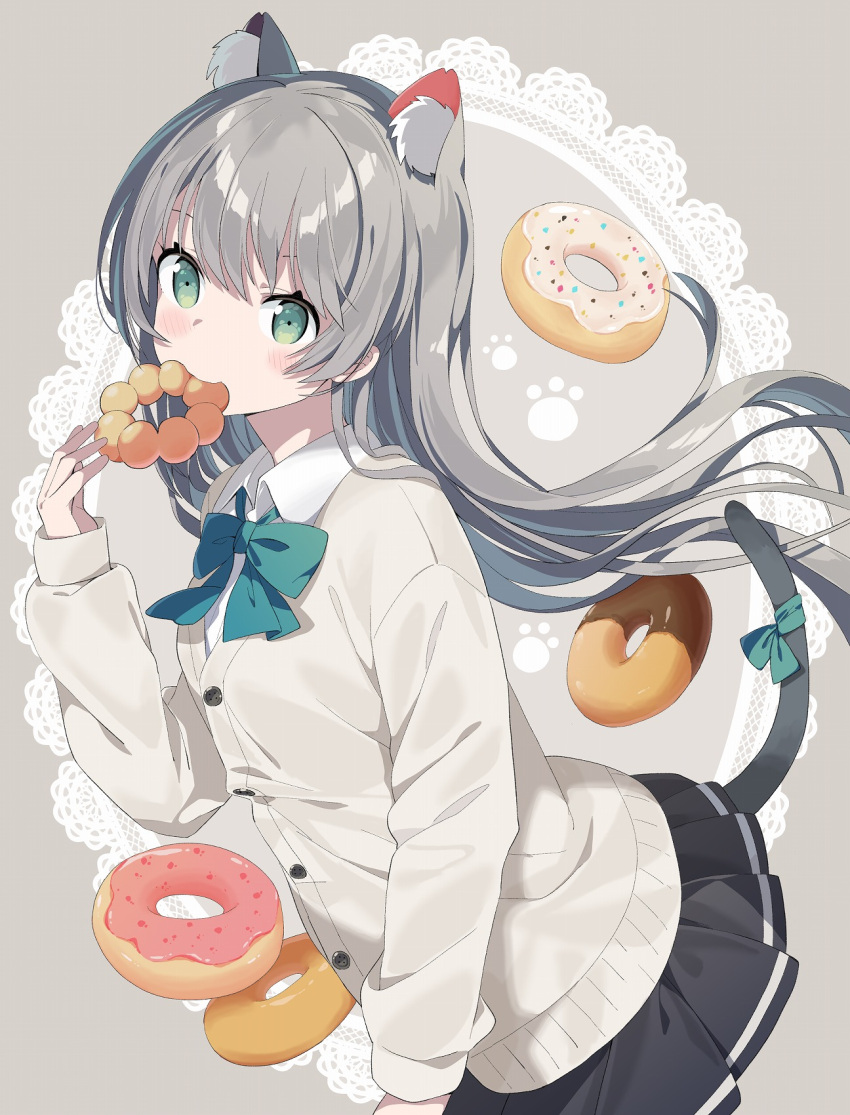 1girl animal_ear_fluff animal_ears black_skirt blush bow bowtie buttons cardigan cat_ears cat_tail collared_shirt commentary_request doily doughnut food green_bow green_bowtie green_eyes grey_background grey_cardigan grey_hair highres long_hair long_sleeves mouth_hold original pleated_skirt shirt skirt solo tail tantan_men_(dragon) white_shirt