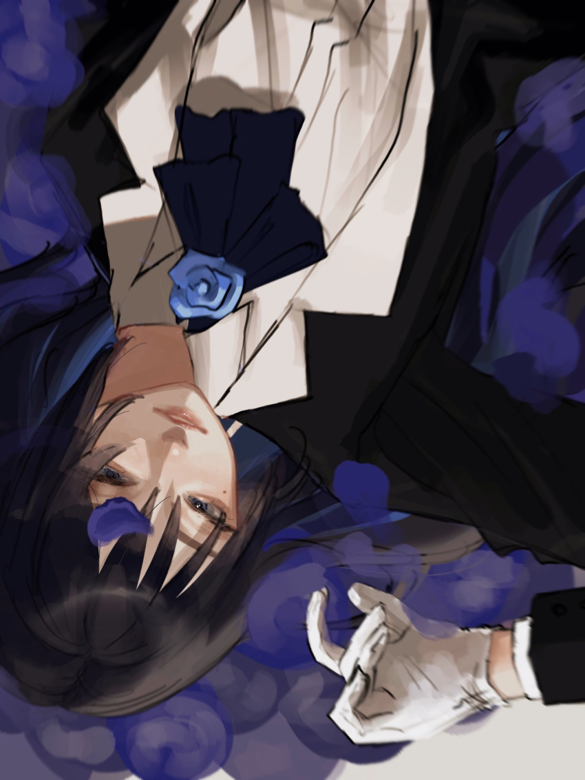 1girl ado_(utaite) ascot black_hair black_jacket blue_ascot blue_eyes blue_hair chando_(ado) cloud_nine_inc collared_shirt colored_inner_hair commentary dress_shirt falling_petals gloves highres jacket long_hair long_sleeves lying mole mole_under_eye multicolored_hair on_back open_clothes open_jacket parted_lips petals shirt solo two-tone_hair upside-down utaite white_gloves white_shirt yurosuke