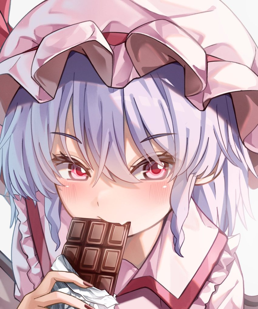 1girl blue_hair candy chocolate chocolate_bar collared_shirt commentary_request eating food hat hat_ribbon highres looking_at_viewer maboroshi_mochi mob_cap pink_headwear pink_shirt portrait red_eyes red_ribbon remilia_scarlet ribbon shirt solo touhou white_background