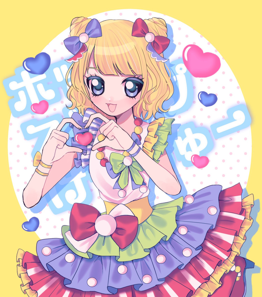 1girl :d blonde_hair blue_bow blue_eyes blunt_bangs blush bow cone_hair_bun curly_hair double_bun dress frilled_dress frills hair_bow hair_bun hands_up heart heart_hands highres idol_clothes layered_skirt looking_at_viewer minami_mirei multicolored_clothes multicolored_dress open_mouth polka_dot polka_dot_background pretty_series pripara red_bow short_hair skirt smile solo yellow_background yuni_(ramm_sweet)