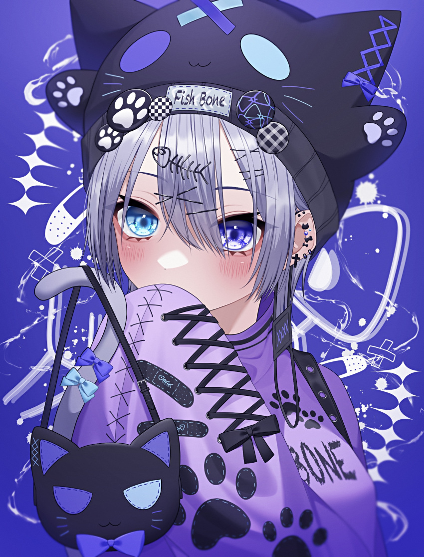 1girl animal_bag animal_hat badge blue_background blue_eyes blush bow bow_earrings button_badge cat_bag cat_earrings cat_hat cat_tail covering_mouth cross cross_earrings earrings eyepatch eyepatch_pull fish_skeleton fish_skeleton_hair_ornament grey_hair hair_ornament hairclip hat heterochromia highres jewelry long_sleeves looking_at_viewer medical_eyepatch multiple_piercings original paw_print short_hair sleeves_past_fingers sleeves_past_wrists solo tail upper_body wanko_(yurika0320) x_hair_ornament