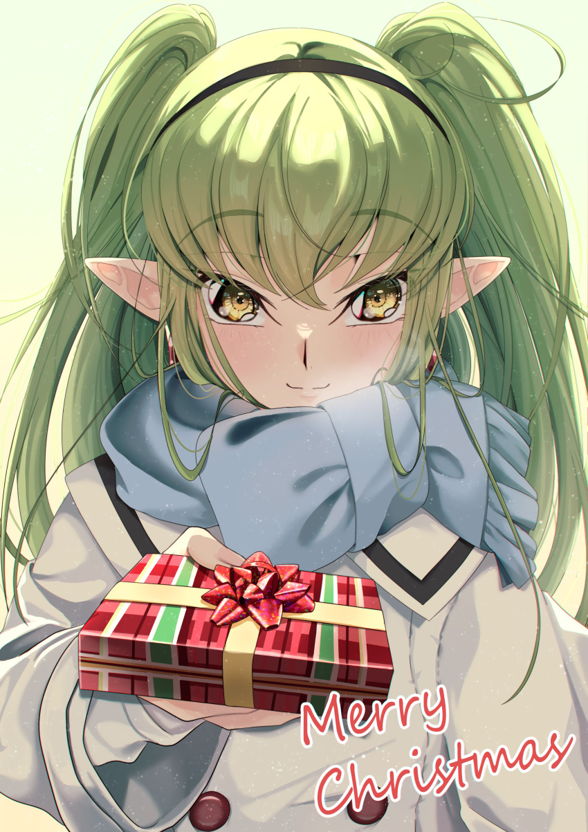 1girl absurdres black_hairband blue_scarf blush box breath budgiepon c.c. closed_mouth coat code_geass commentary cosplay enpera eyelashes frieren frieren_(cosplay) fringe_trim gift gift_box green_background green_hair hair_between_eyes hairband hand_up highres holding holding_gift incoming_gift long_hair long_sleeves looking_at_viewer merry_christmas pointy_ears scarf sidelocks simple_background smile snowing solo sousou_no_frieren straight-on straight_hair twintails two_side_up upper_body very_long_hair white_coat wide_sleeves winter_clothes yellow_eyes