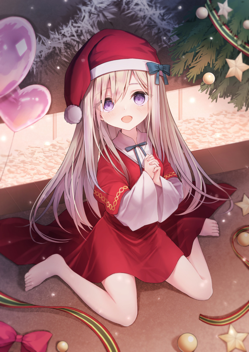 1girl :d balloon barefoot blue_bow bow capelet christmas christmas_ornaments christmas_tree commentary_request hair_between_eyes hat hat_bow heart_balloon highres interlocked_fingers light_brown_hair long_sleeves looking_at_viewer nishina_kakeri original own_hands_clasped own_hands_together red_capelet red_skirt santa_costume santa_hat shirt sitting skirt smile solo star_(symbol) violet_eyes wariza white_shirt wide_sleeves