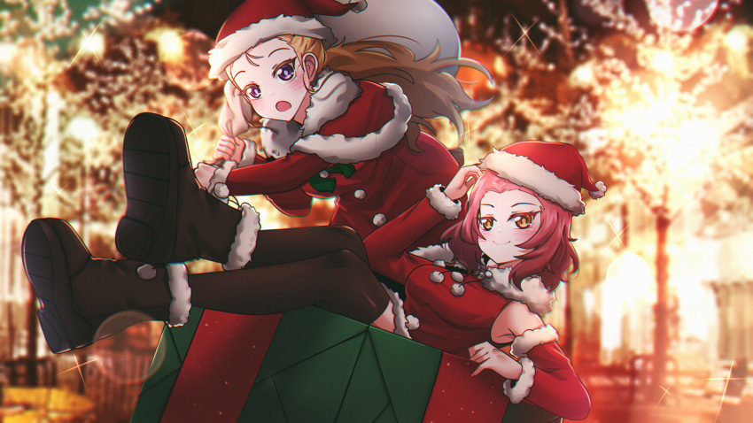 2girls absurdres adjusting_clothes adjusting_headwear assam_(girls_und_panzer) black_footwear black_thighhighs blonde_hair blurry blurry_background bokeh capelet christmas_tree commentary depth_of_field detached_sleeves dress fur-trimmed_dress fur-trimmed_footwear fur-trimmed_sleeves fur_trim gift girls_und_panzer hair_pulled_back hat highres holding holding_sack leaning_forward long_hair long_sleeves medium_hair mizzterbii multiple_girls night orange_eyes outdoors over_shoulder oversized_object red_capelet red_dress red_headwear red_sleeves redhead rosehip_(girls_und_panzer) sack santa_dress santa_hat short_dress sitting sleeveless sleeveless_dress sparkle standing symbol-only_commentary thigh-highs violet_eyes