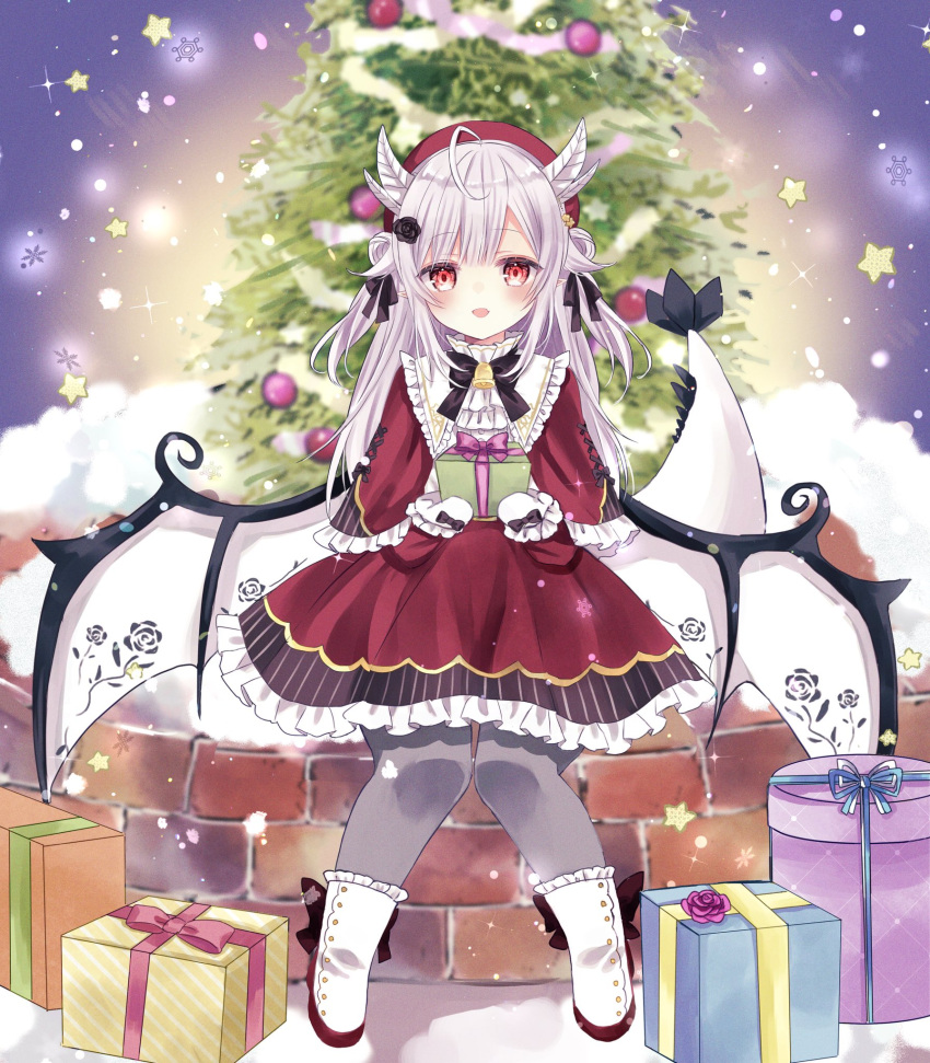 ahoge alternate_costume beret blurry blurry_background blush box christmas_tree commentary double_bun dragon_tail dragon_wings gift gift_box gloves grey_hair hair_bun hair_ornament hat highres holding holding_gift indie_virtual_youtuber kamuri_amuru long_hair looking_at_viewer open_mouth pantyhose red_eyes ribbon santa_costume shoes simple_background sitting snow tail tree virtual_youtuber wings