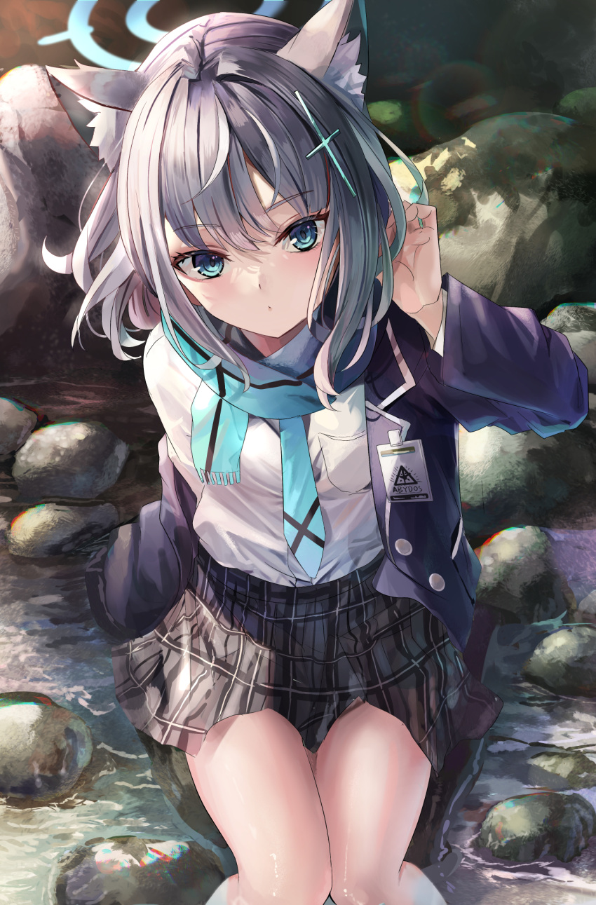 1girl animal_ear_fluff animal_ears arm_support black_skirt blazer blue_archive blue_eyes blue_scarf blurry collared_shirt commentary cross_hair_ornament depth_of_field extra_ears grey_hair hair_between_eyes hair_ornament halo highres jacket knees_together_feet_apart long_sleeves looking_at_viewer medium_hair mismatched_pupils outdoors plaid plaid_skirt playing_with_own_hair pleated_skirt river rock scarf school_uniform shiroko_(blue_archive) shirt sidelocks sitting skirt solo suidou_chaahan wet white_shirt wolf_ears wolf_girl