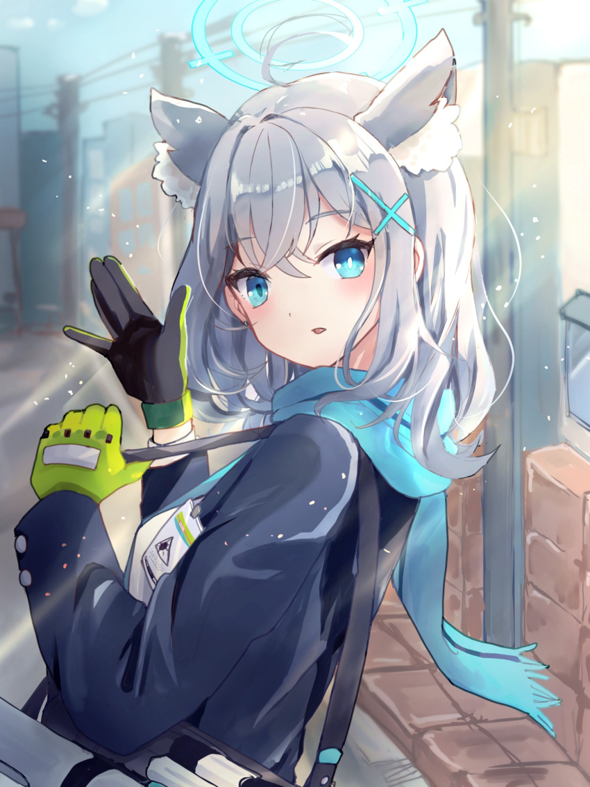 1girl animal_ear_fluff animal_ears black_gloves black_jacket blue_archive blue_eyes blue_halo blue_scarf commentary cross_hair_ornament extra_ears gloves green_gloves grey_hair hair_ornament halo highres jacket komena_(shinyday312) long_sleeves looking_at_viewer medium_hair mismatched_pupils open_mouth outdoors revision scarf shiroko_(blue_archive) smile solo two-tone_gloves upper_body wolf_ears