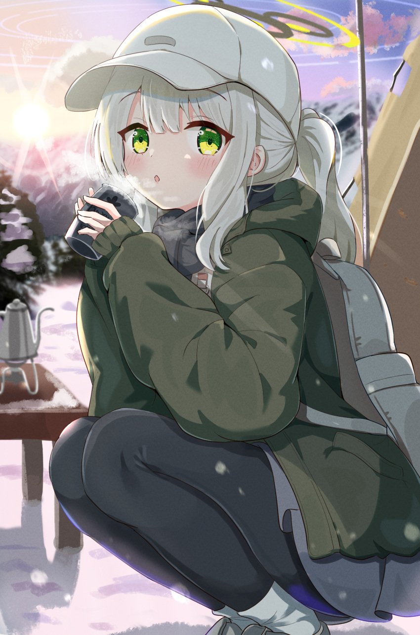 1girl absurdres backpack bag black_pantyhose blue_archive blush boots commentary cup green_eyes green_jacket grey_footwear grey_hair grey_skirt hair_between_eyes halo hare_(blue_archive) hare_(camp)_(blue_archive) hat highres holding holding_cup jacket long_hair long_sleeves looking_at_viewer mikumiku37 official_alternate_costume outdoors pantyhose parted_lips ponytail skirt solo squatting white_headwear