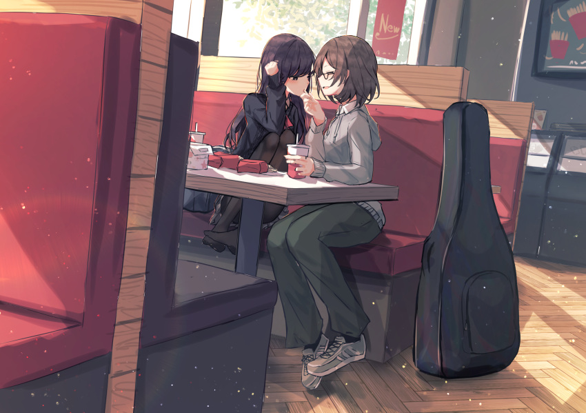 2girls benevole black_hair black_pants black_pantyhose black_sweater bow bowtie brown_hair commentary_request commission glasses grey_hoodie guitar_case hair_tucking highres hood hood_down hoodie indoors instrument_case light_particles long_hair long_sleeves multiple_girls no_shoes original pants pantyhose red_bow red_bowtie short_hair sitting skeb_commission sunlight sweater yuri