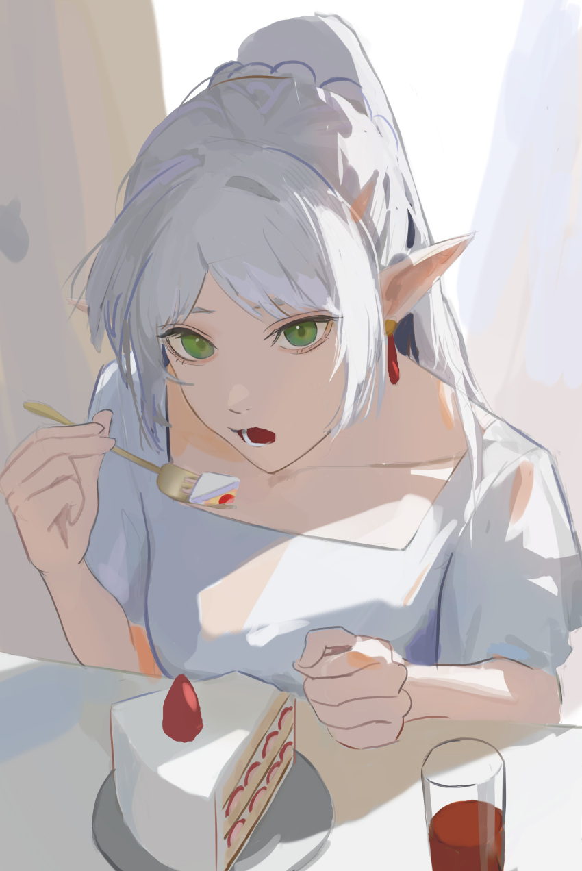 1girl absurdres cake cake_slice commentary dangle_earrings earrings eating food fork frieren glass green_eyes highres holding holding_fork jewelry long_hair looking_at_viewer lower_teeth_only open_mouth plate pointy_ears ponytail shirt solo sousou_no_frieren teeth white_hair white_shirt yoswr