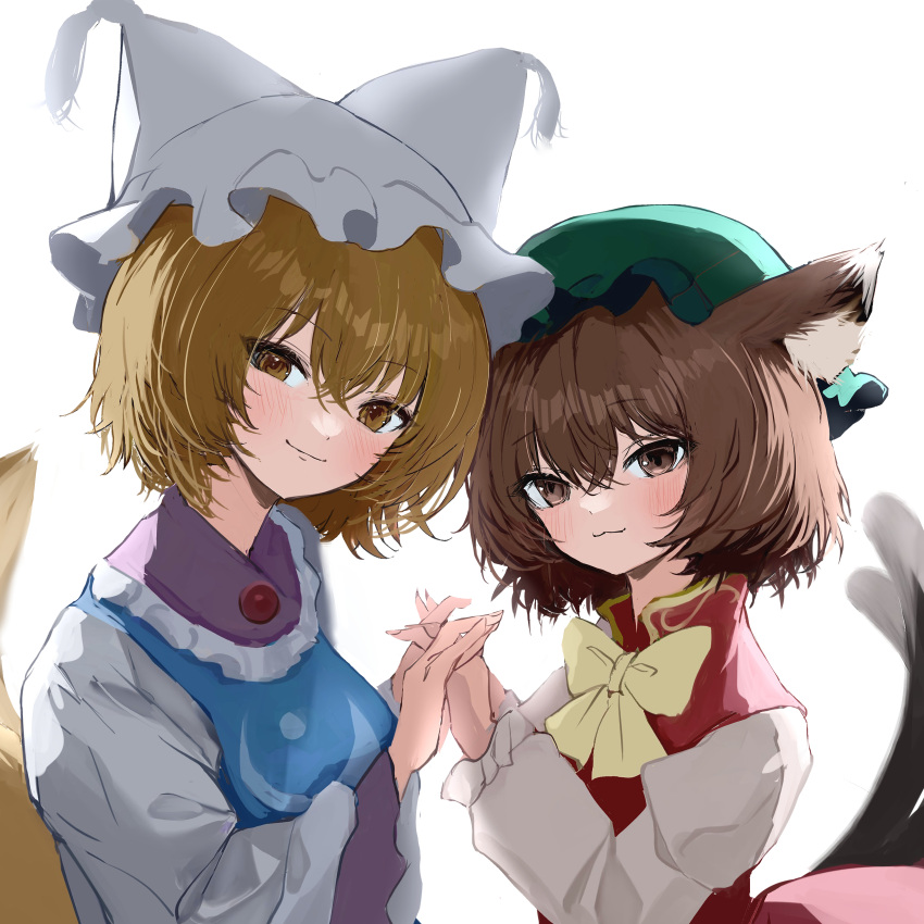 2girls :3 absurdres animal_ears bloom bow bowtie brown_eyes brown_hair cat_ears cat_tail chen closed_mouth commentary_request dress fox_ears fox_tail from_side green_headwear hair_between_eyes hands_up hat highres interlocked_fingers light_brown_hair light_smile looking_at_viewer mikan_(manmarumikan) mob_cap multiple_girls multiple_tails nekomata red_vest short_hair simple_background tabard tail touhou two_tails upper_body vest white_background white_bow white_bowtie white_dress white_headwear wide_sleeves yakumo_ran