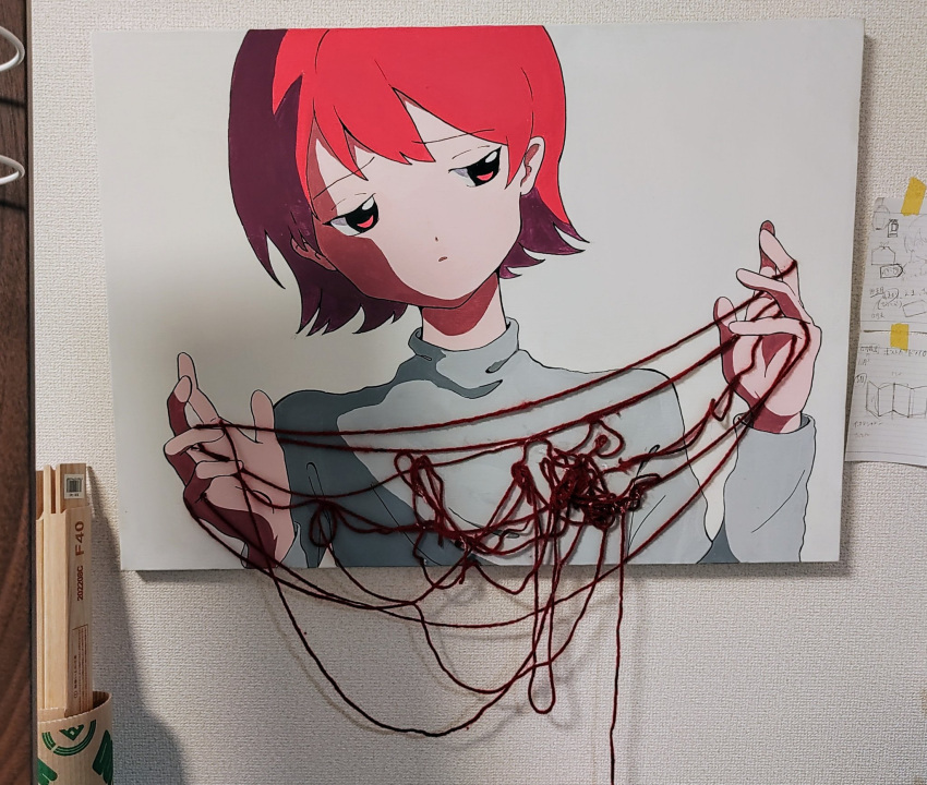 1girl acrylic_paint_(medium) commentary_request grey_shirt hands_up highres long_sleeves momoe_(mme_daigaku) original painting_(medium) parted_lips photo_(medium) pink_eyes redhead shirt short_hair sideways_glance solo tangle traditional_media upper_body white_background yarn