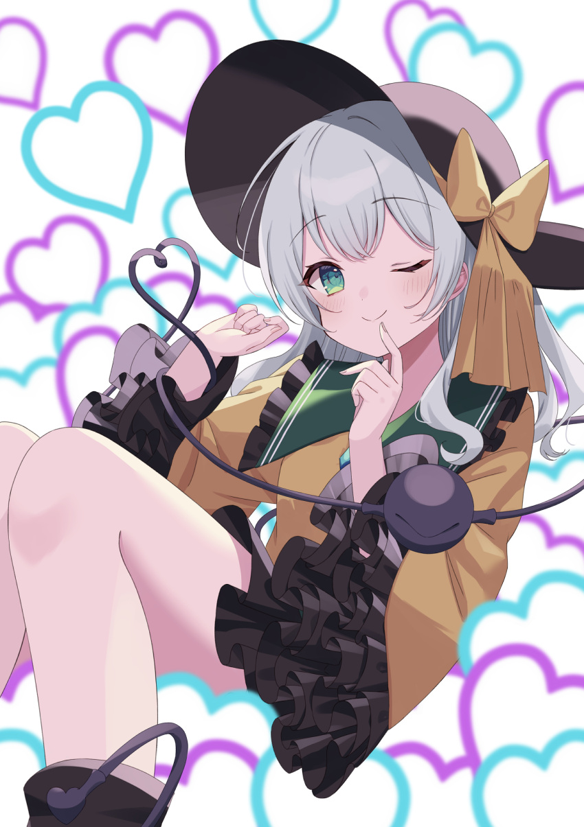 1girl ;) black_headwear blush bow clenched_hand closed_mouth commentary danmaku feet_out_of_frame frilled_sleeves frills green_eyes green_sailor_collar grey_hair hair_between_eyes hands_up hat hat_bow heart heart_background heart_of_string highres index_finger_raised jacket kamachi_(kamati0maru) knees_up komeiji_koishi long_sleeves looking_at_viewer medium_hair one_eye_closed sailor_collar smile solo third_eye touhou wide_sleeves yellow_bow yellow_jacket