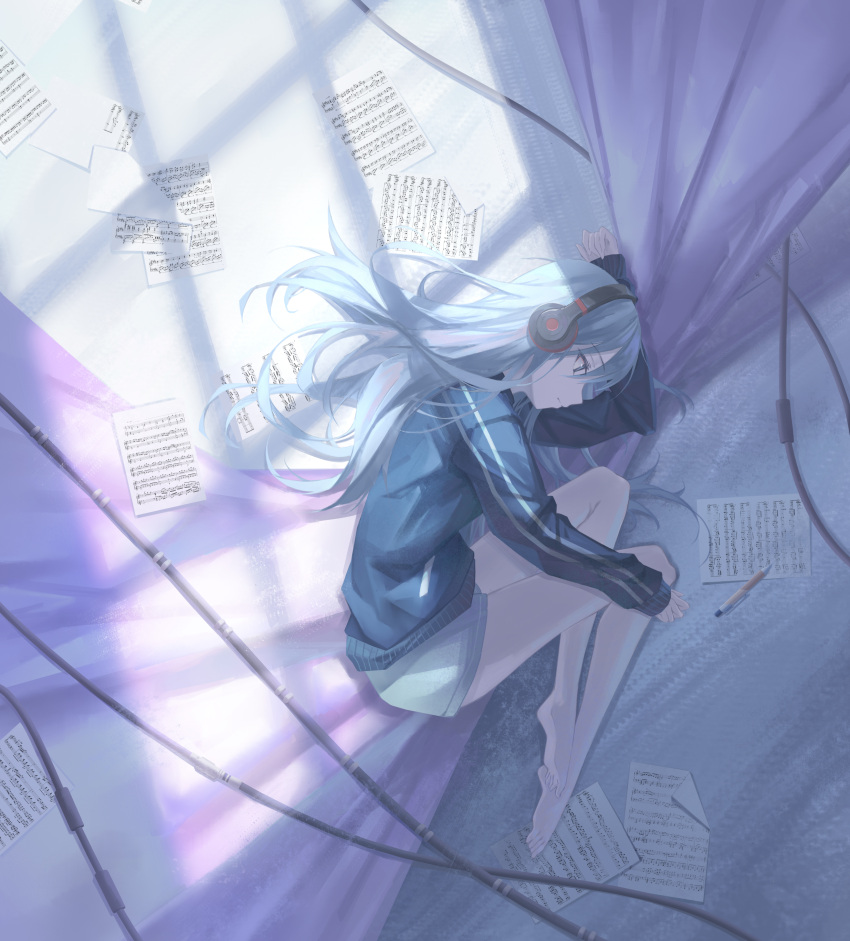 1girl absurdres bare_legs barefoot blue_eyes blue_jacket english_commentary expressionless full_body grey_hair grey_pants headphones highres jacket long_hair looking_to_the_side lying on_side pants pen pine50 project_sekai sheet_music sleeves_past_wrists solo window_shade yoisaki_kanade