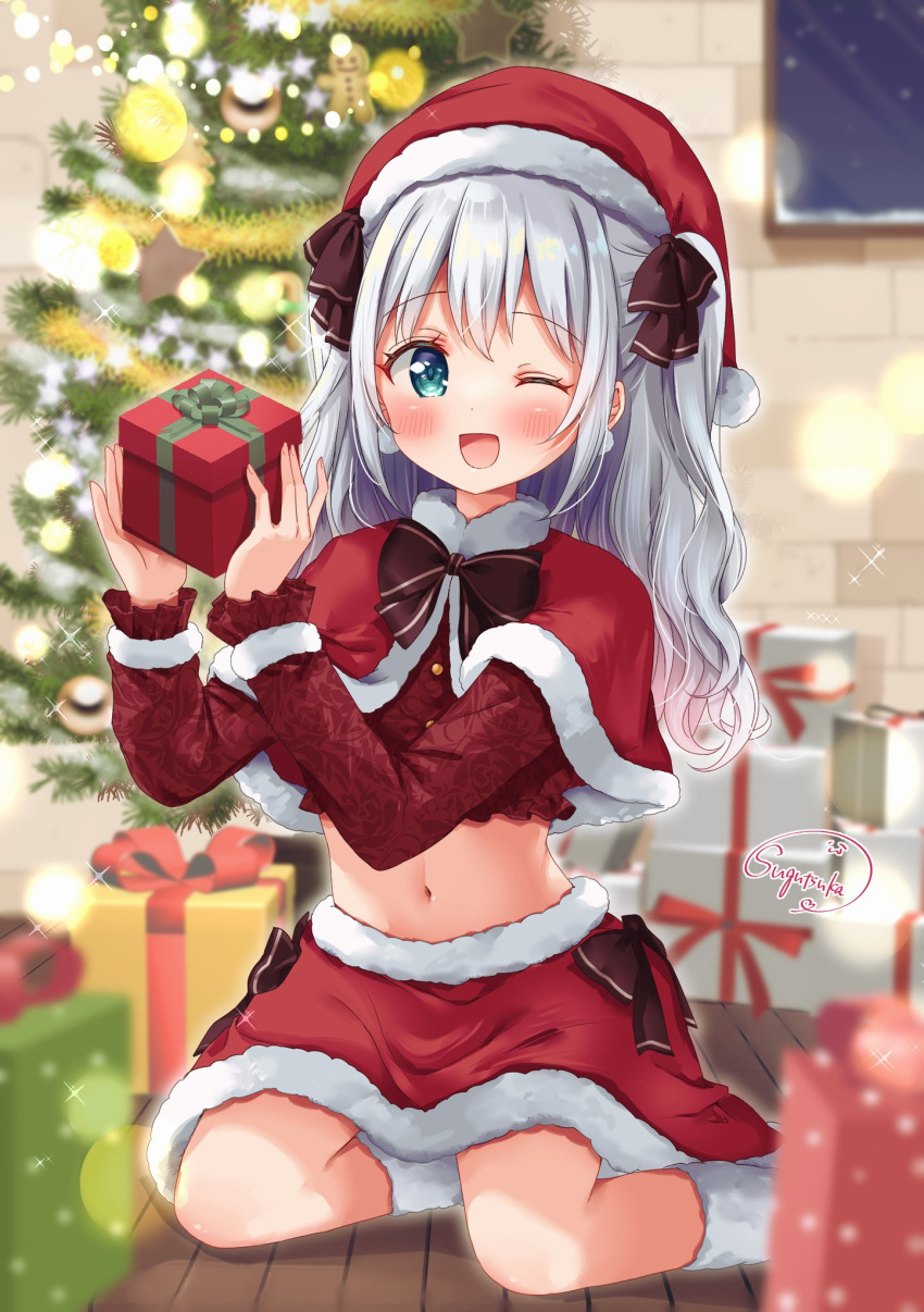 1girl :d artist_name blurry blurry_background blush boots bow bowtie box christmas christmas_ornaments christmas_tree commission curly_hair depth_of_field eyebrows_hidden_by_hair fur-trimmed_headwear fur-trimmed_sleeves fur_trim gift gift_box grey_hair hands_up hat highres holding holding_gift kneeling long_hair midriff navel on_ground original red_headwear ribbon santa_costume santa_hat sidelocks sitting skeb_commission smile solo sugutsuka_rerun two_side_up wariza
