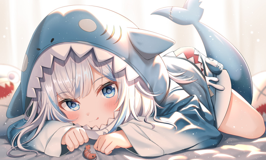 1girl :q animal_hood bed_sheet blue_eyes blue_hair blue_hoodie blurry blurry_background blush closed_mouth commentary_request curtains depth_of_field fins fish_tail gawr_gura gawr_gura_(1st_costume) grey_hair hololive hololive_english hood hood_up hoodie indoors lokyin_house long_sleeves looking_at_viewer multicolored_hair shark_hood shark_tail sleeves_past_wrists smile solo streaked_hair tail tongue tongue_out virtual_youtuber wide_sleeves