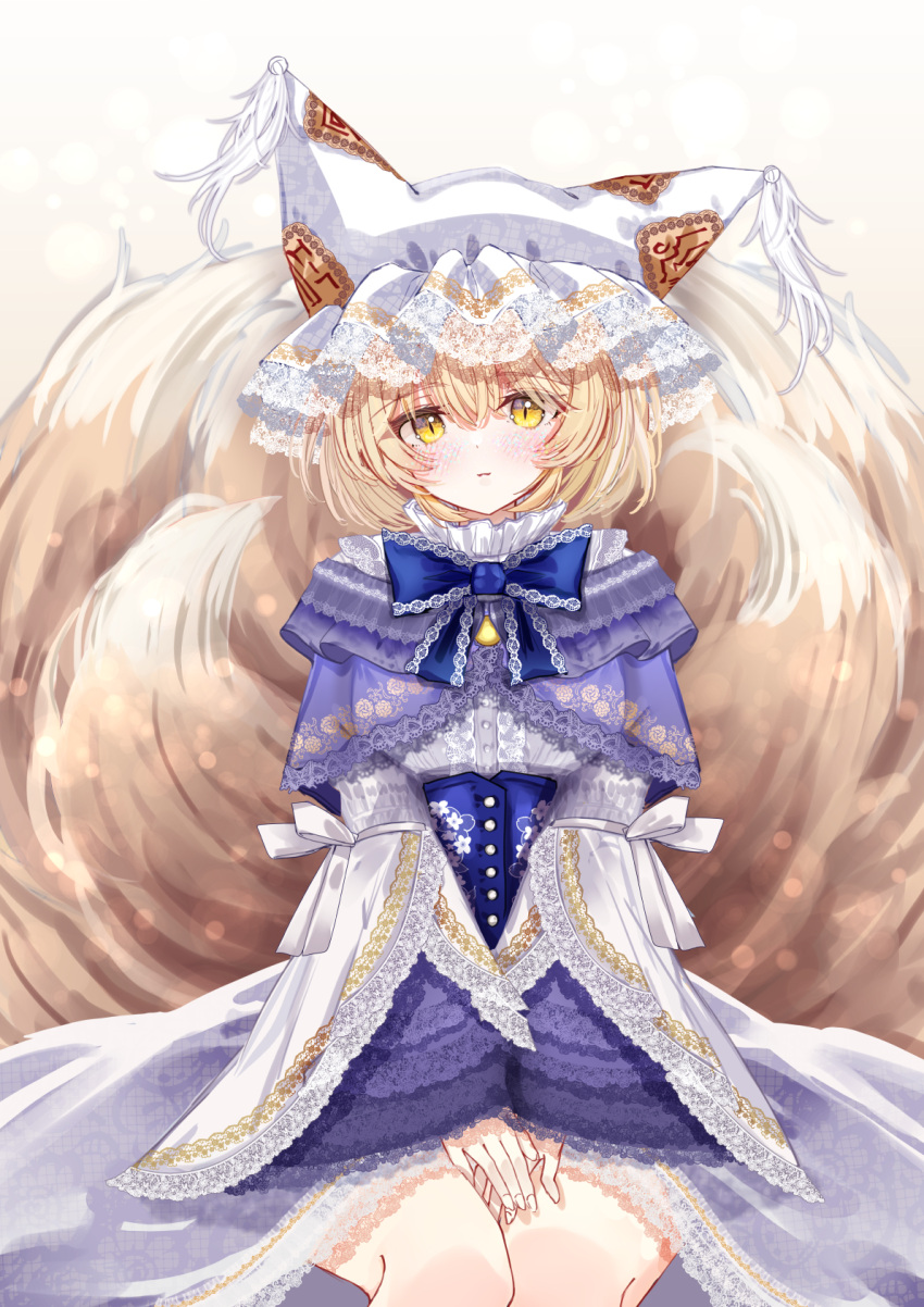 1girl adapted_costume animal_hat blonde_hair blue_corset closed_mouth commentary_request corset dress feet_out_of_frame floral_print fox_tail hat highres lace-trimmed_bowtie lace-trimmed_dress lace-trimmed_headwear lace-trimmed_sleeves lace_trim long_sleeves looking_at_viewer multiple_tails own_hands_together sarasadou_dan short_hair simple_background sitting solo tail touhou white_background white_headwear wide_sleeves yakumo_ran yellow_eyes