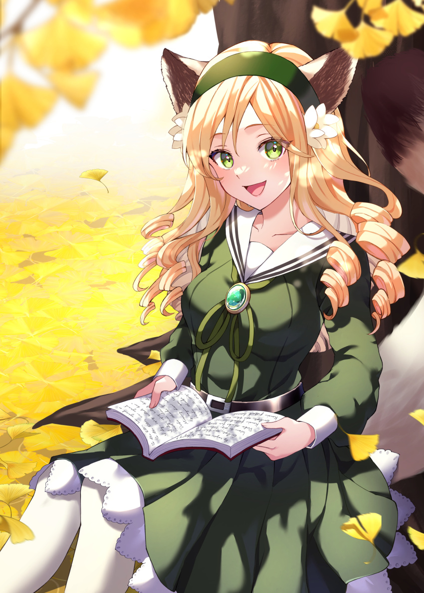 1girl :d absurdres animal_ears belt blonde_hair blurry blurry_foreground book breasts commission curly_hair dress falling_leaves flower fox_ears gem ginkgo_tree green_dress green_eyes green_gemstone green_hairband hair_flower hair_ornament hairband highres holding holding_book leaf long_hair looking_at_viewer medium_breasts open_book open_mouth original outdoors pantyhose sailor_collar sitting skeb_commission smile solo wanatsu_15 white_pantyhose white_sailor_collar yellow_leaves