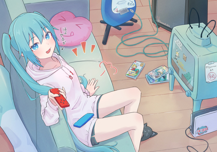 1girl amplifier animal_slippers blue_eyes blue_hair cable cat_slippers couch fang guitar handheld_game_console hatsune_miku heart heart-shaped_pillow highres holding hood hoodie indoors instrument kagamine_rin konami_code long_hair looking_at_viewer nintendo_switch nintendo_switch_dock open_mouth pillow shorts sitting slippers smile solo super_mario_bros. television translation_request twintails very_long_hair vocaloid yasuno-labo