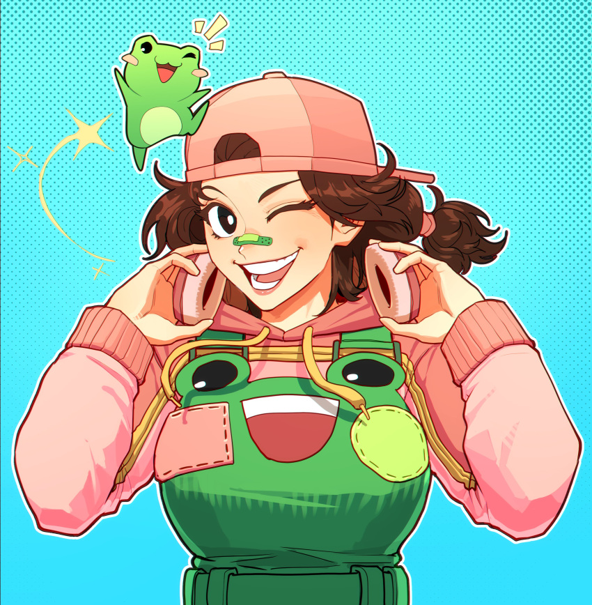 1girl absurdres animal_costume backwards_hat bandaid bandaid_on_face bandaid_on_nose baseball_cap black_eyes blue_background breasts brown_eyes brown_hair chibi chibi_inset commission drawstring flipped_hair frog frog_costume gradient_background green_overalls halftone halftone_background hands_up hat headphones highres holding holding_headphones hood hood_down hoodie long_sleeves looking_at_viewer medium_breasts medium_hair one_eye_closed open_mouth original outline overalls patchwork_clothes pink_headwear pink_hoodie ponytail sleeve_cuffs smile solo sparkle teeth thirdphp tongue two-tone_eyes upper_body wavy_hair white_outline