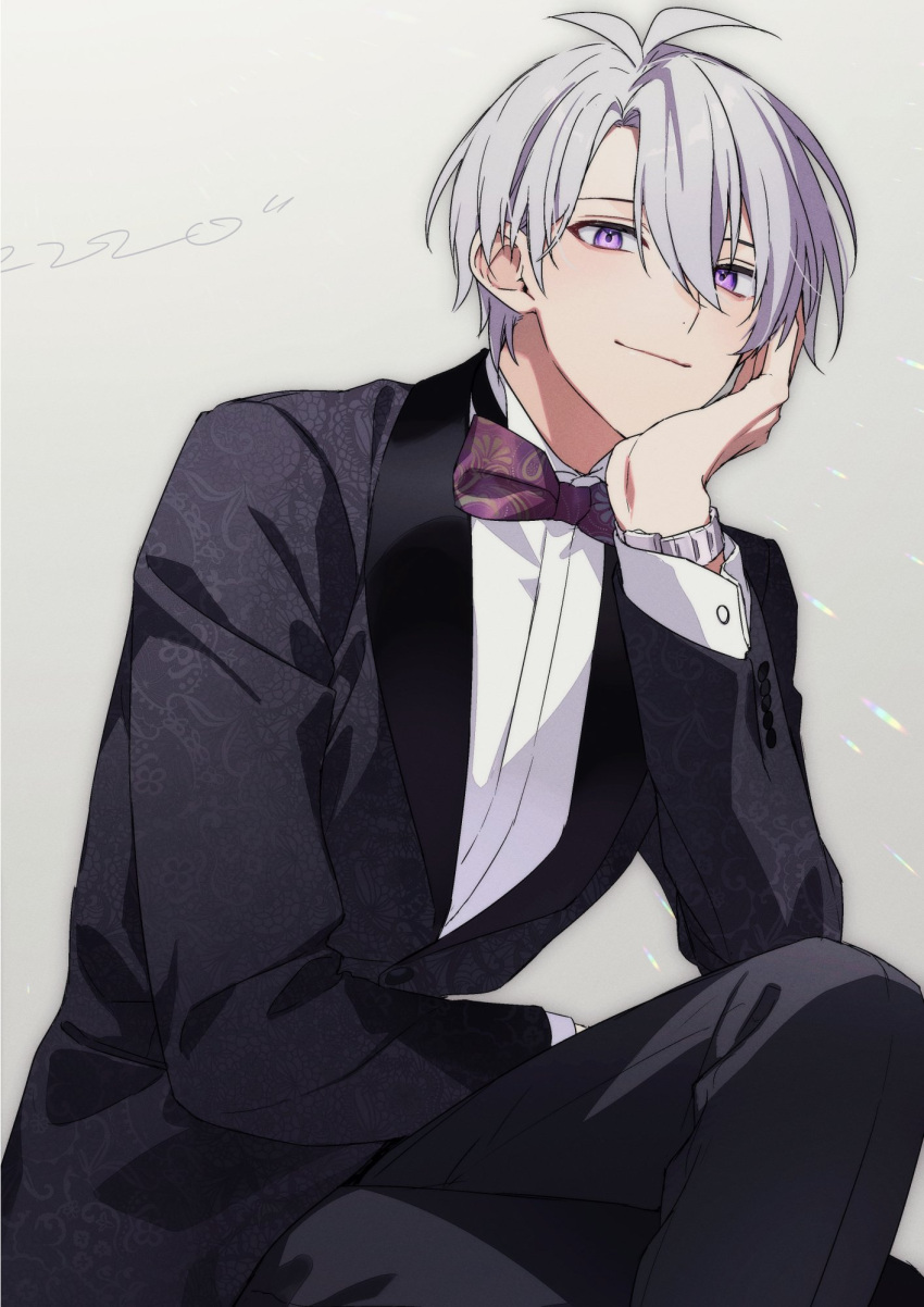 1boy ahoge aiue_o_eiua black_jacket black_pants bow bowtie brown_background closed_mouth formal grey_hair head_rest highres idolish7 jacket male_focus osaka_sougo pants red_bow red_bowtie shirt short_hair simple_background smile solo violet_eyes watch watch white_shirt