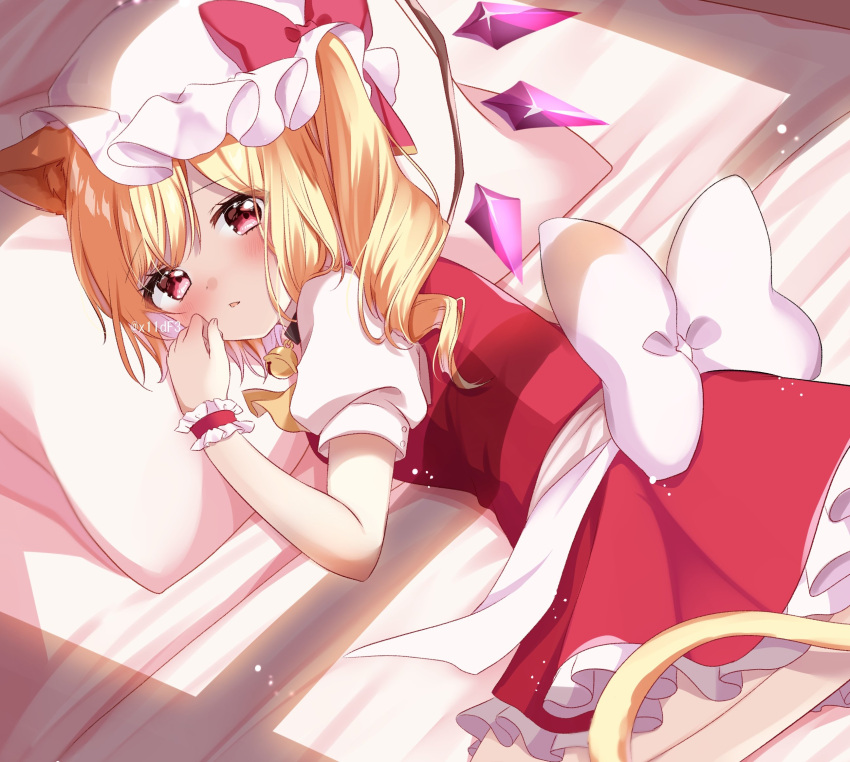 1girl animal_ear_fluff bed_sheet blonde_hair blush cat_tail crystal flandre_scarlet frilled_skirt frills hat highres long_hair mob_cap one_side_up open_mouth pillow puffy_short_sleeves puffy_sleeves red_eyes red_skirt red_vest shinonome_asu shirt short_sleeves skirt solo tail touhou vest white_headwear white_shirt wings