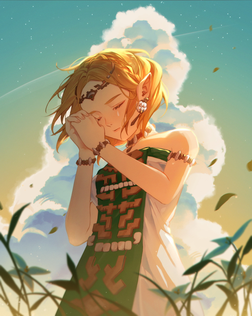1girl absurdres armlet blonde_hair bracelet circlet closed_eyes clouds cumulonimbus_cloud dress earrings gradient_sky grass green_tabard highres jewelry own_hands_clasped own_hands_together panwhatcake pointy_ears praying princess_zelda short_hair sky solo star_(sky) strapless strapless_dress tabard the_legend_of_zelda the_legend_of_zelda:_tears_of_the_kingdom white_dress