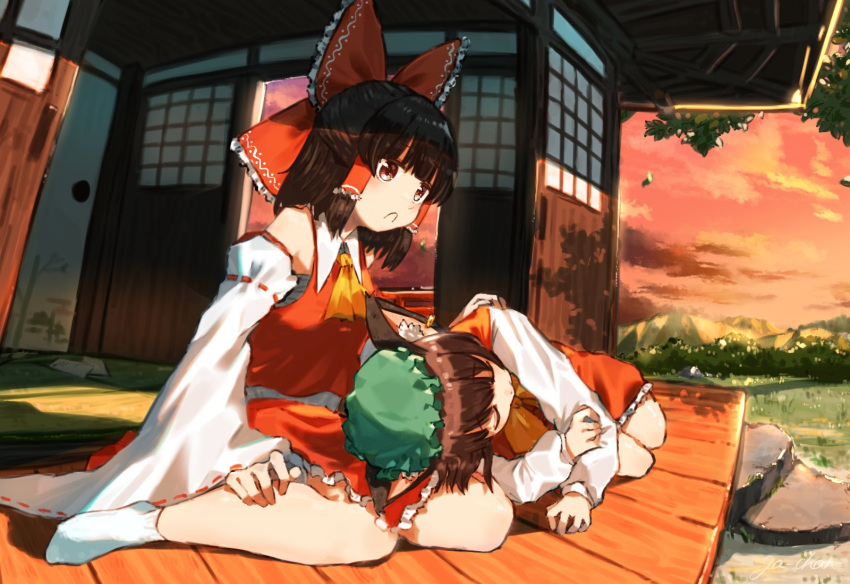 2girls animal_ear_fluff animal_ear_piercing animal_ears ascot bare_legs bare_shoulders blunt_bangs bow breasts brown_eyes brown_hair cat_ears chen commentary_request detached_sleeves dress earrings fisheye frilled_bow frilled_hair_tubes frills frown full_body ga-chan24 green_headwear hair_bow hair_tubes hakurei_reimu hat highres jewelry lap_pillow long_sleeves lying medium_breasts medium_hair mob_cap multiple_girls no_shoes on_side puffy_long_sleeves puffy_sleeves red_bow red_dress red_skirt red_vest ribbon-trimmed_sleeves ribbon_trim sarashi short_hair single_earring sitting skirt socks sunset touhou vest wariza white_socks wide_sleeves yellow_ascot